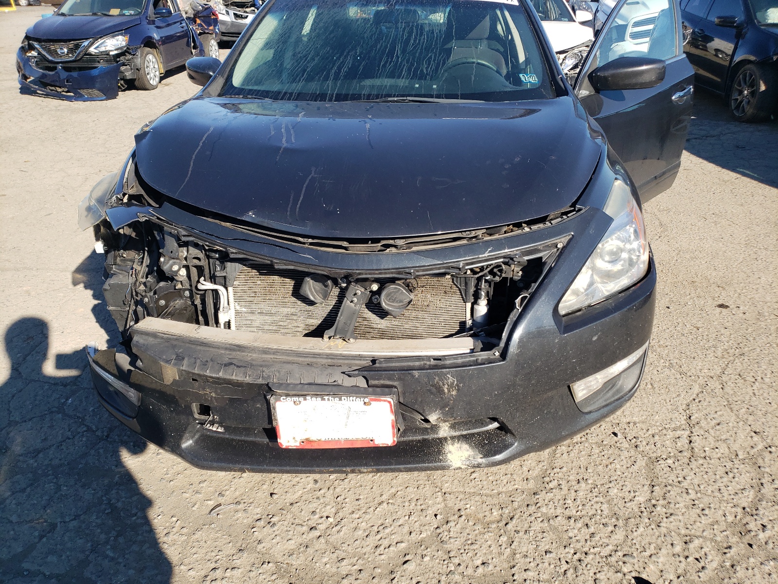 Photo 7 from auction – 2014 NISSAN ALTIMA 2.5 with VIN 1N4AL3AP4EC427654