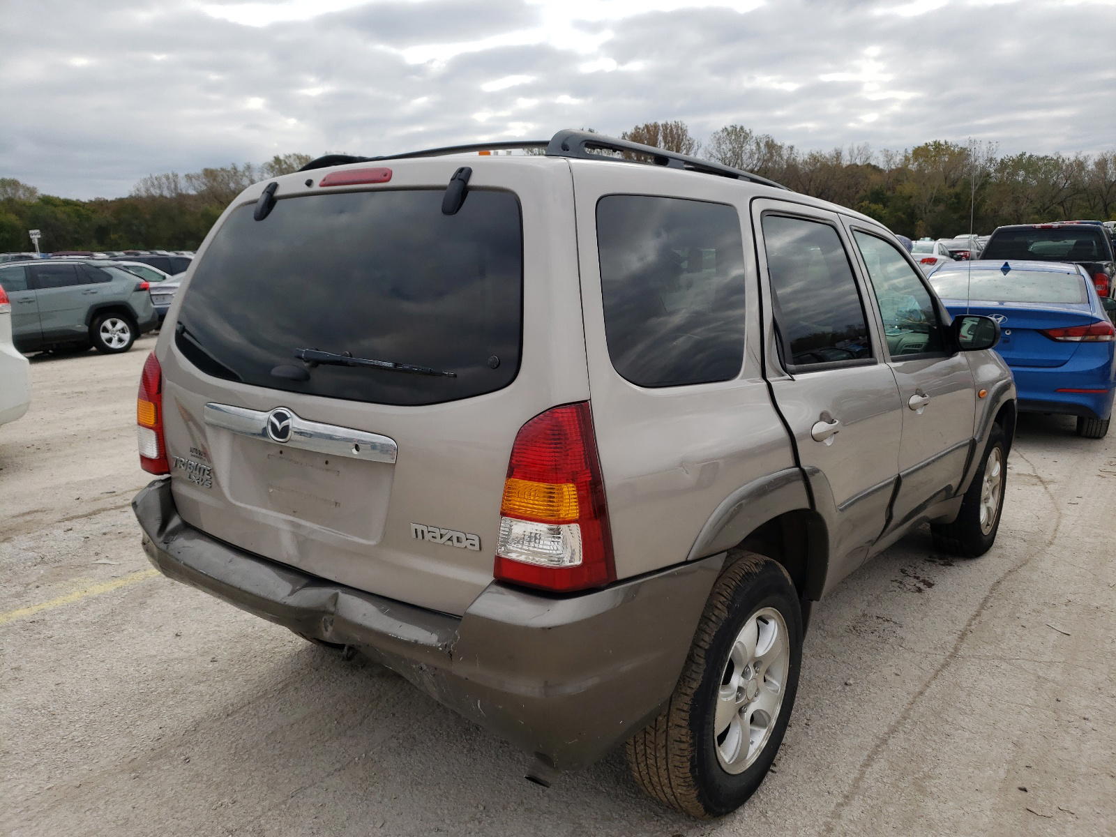 Photo 4 from auction – 2002 MAZDA TRIBUTE LX with VIN 4F2YU09132KM11628
