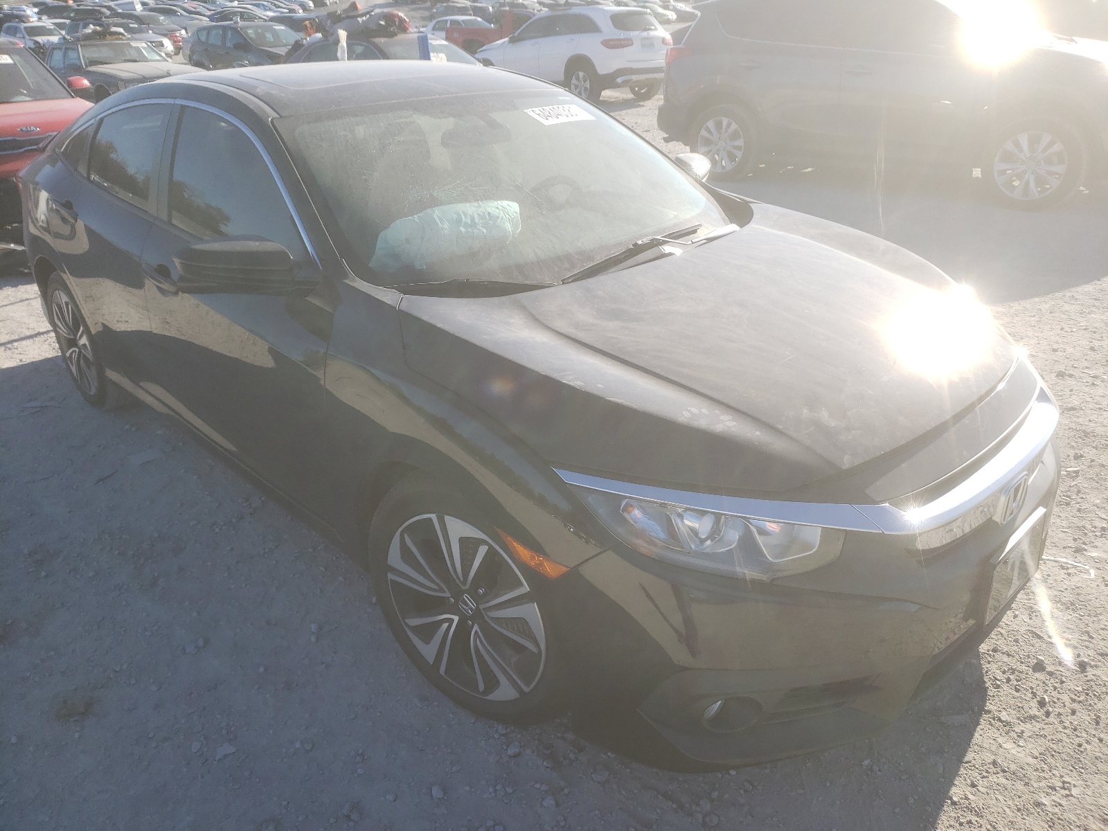 Photo 1 from auction – 2016 HONDA CIVIC EX with VIN 19XFC1F36GE205140