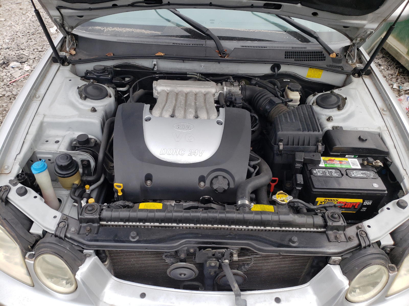 Photo 7 from auction – 2003 KIA OPTIMA LX with VIN KNAGD128935234864