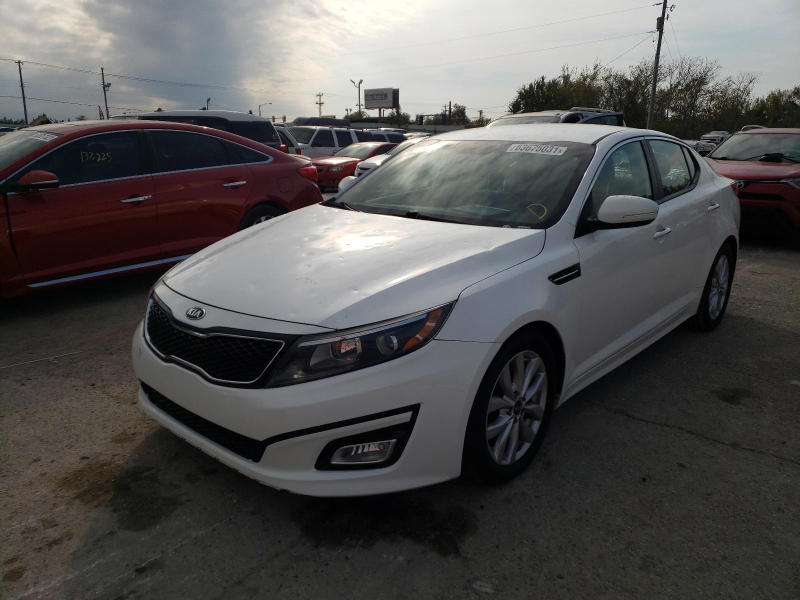 Photo 2 from auction – 2015 KIA OPTIMA LX with VIN KNAGM4A70F5620684