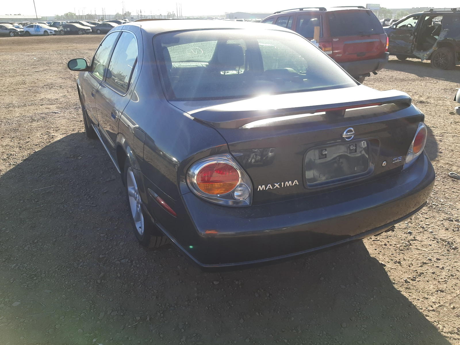 Photo 3 from auction – 2002 NISSAN MAXIMA with VIN JN1DA31AX2T308370