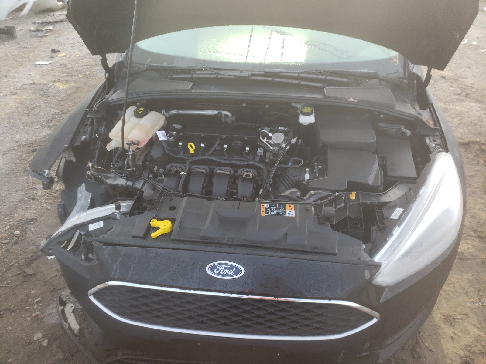 Foto 7 de la subasta – 2018 FORD FOCUS SE con VIN 1FADP3F29JL203076