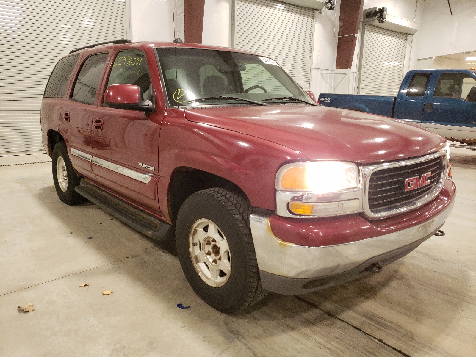 GMC YUKON 2004 with VIN 1GKEK13Z34J139219 - Photo from auction