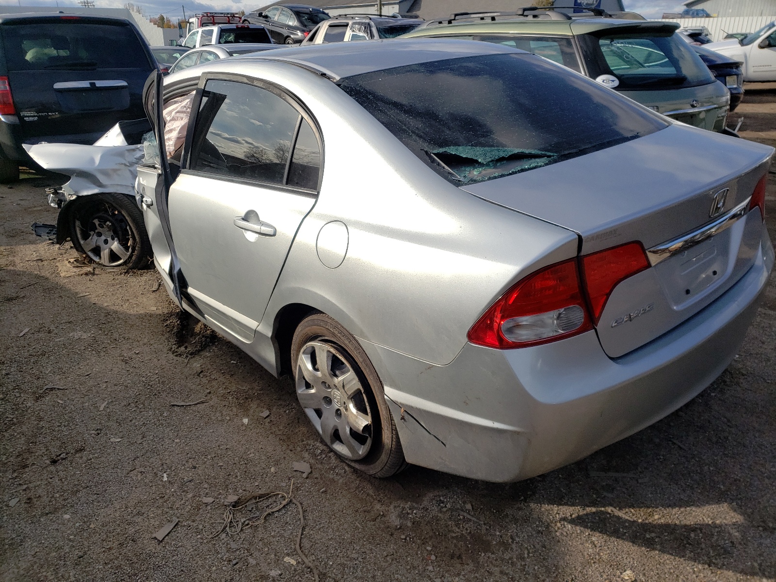 Photo 3 from auction – 2010 HONDA CIVIC LX with VIN 19XFA1F52AE043859