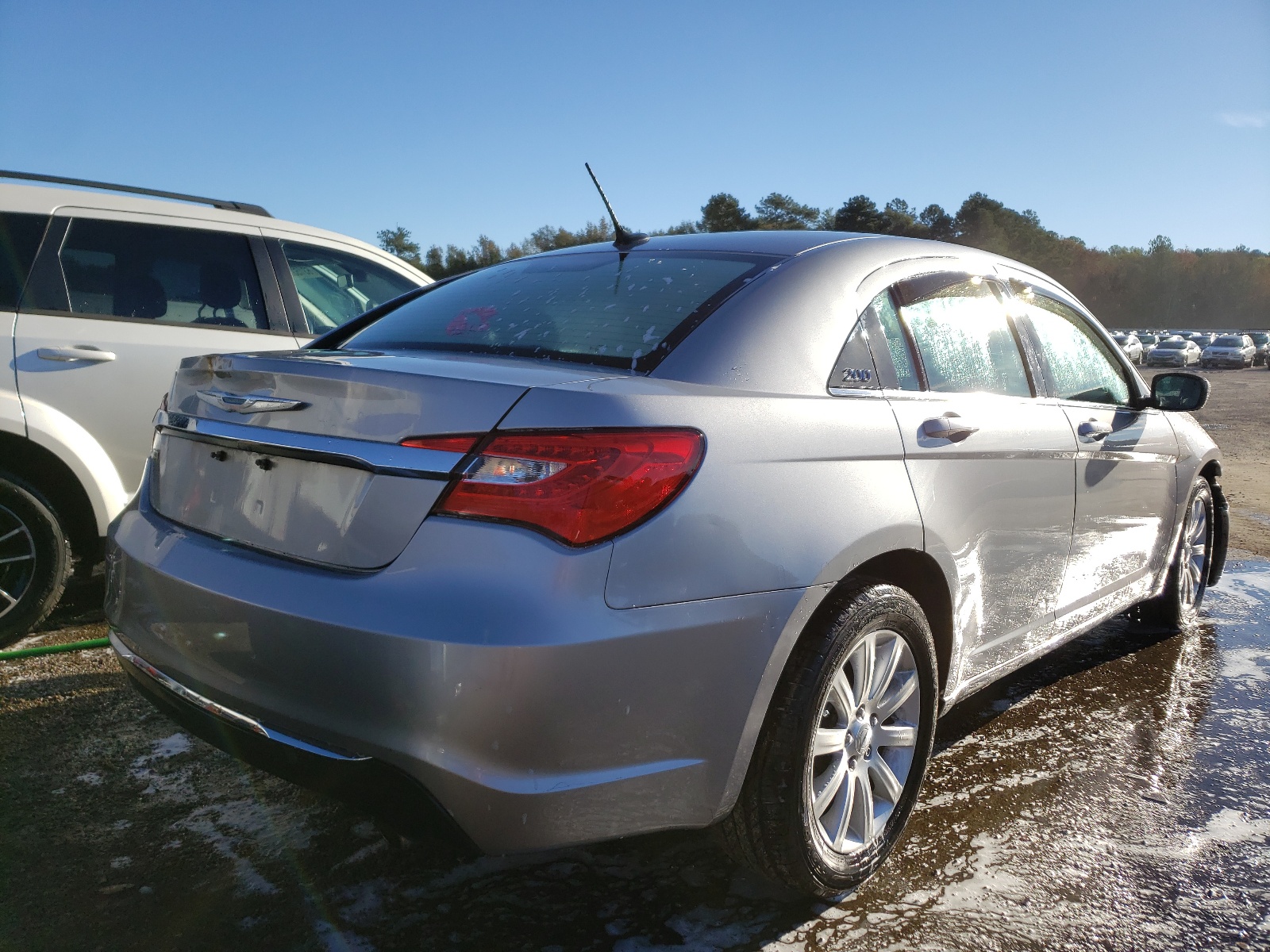 Photo 4 from auction – 2014 CHRYSLER 200 TOURIN with VIN 1C3CCBBG7EN105806