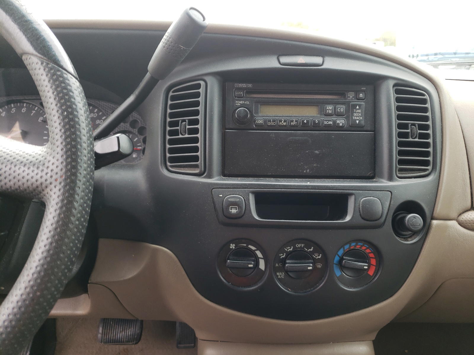 Photo 9 from auction – 2002 MAZDA TRIBUTE LX with VIN 4F2YU09132KM11628