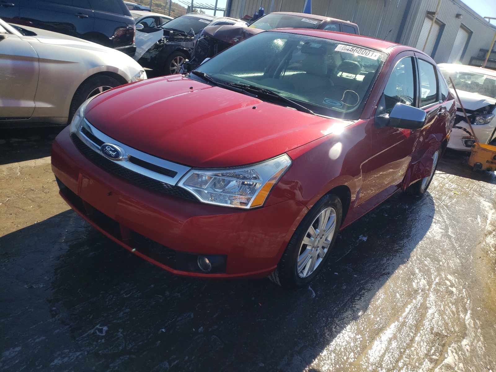Photo 2 from auction – 2011 FORD FOCUS SEL with VIN 1FAHP3HN9BW160058