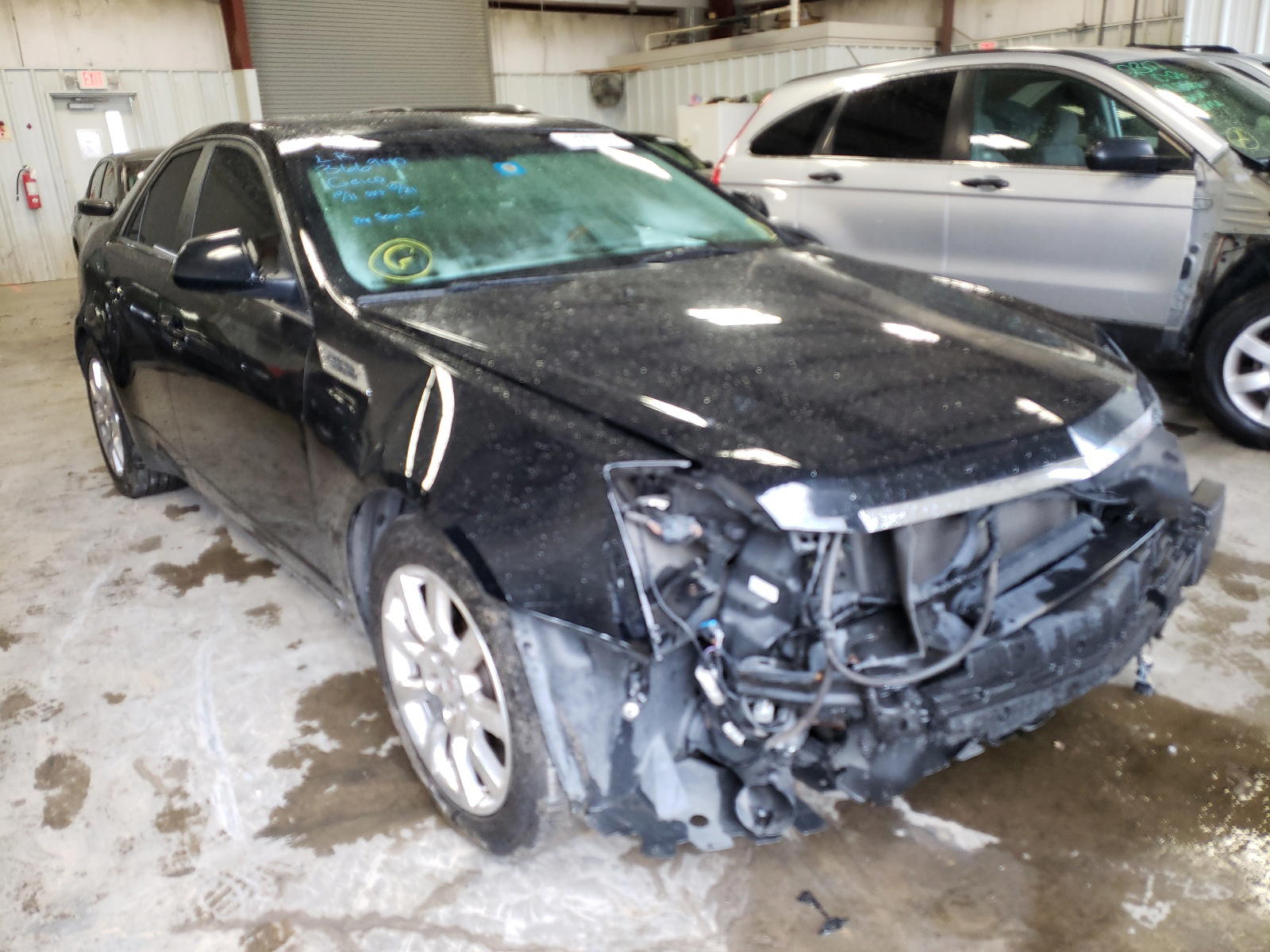 CADILLAC CTS 2009 with VIN 1G6DJ577390139876 - Photo from auction