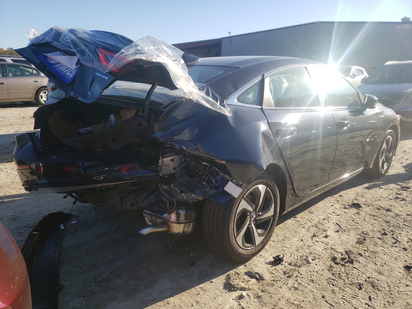 Photo 4 from auction – 2022 HONDA INSIGHT EX with VIN 19XZE4F55NE007916