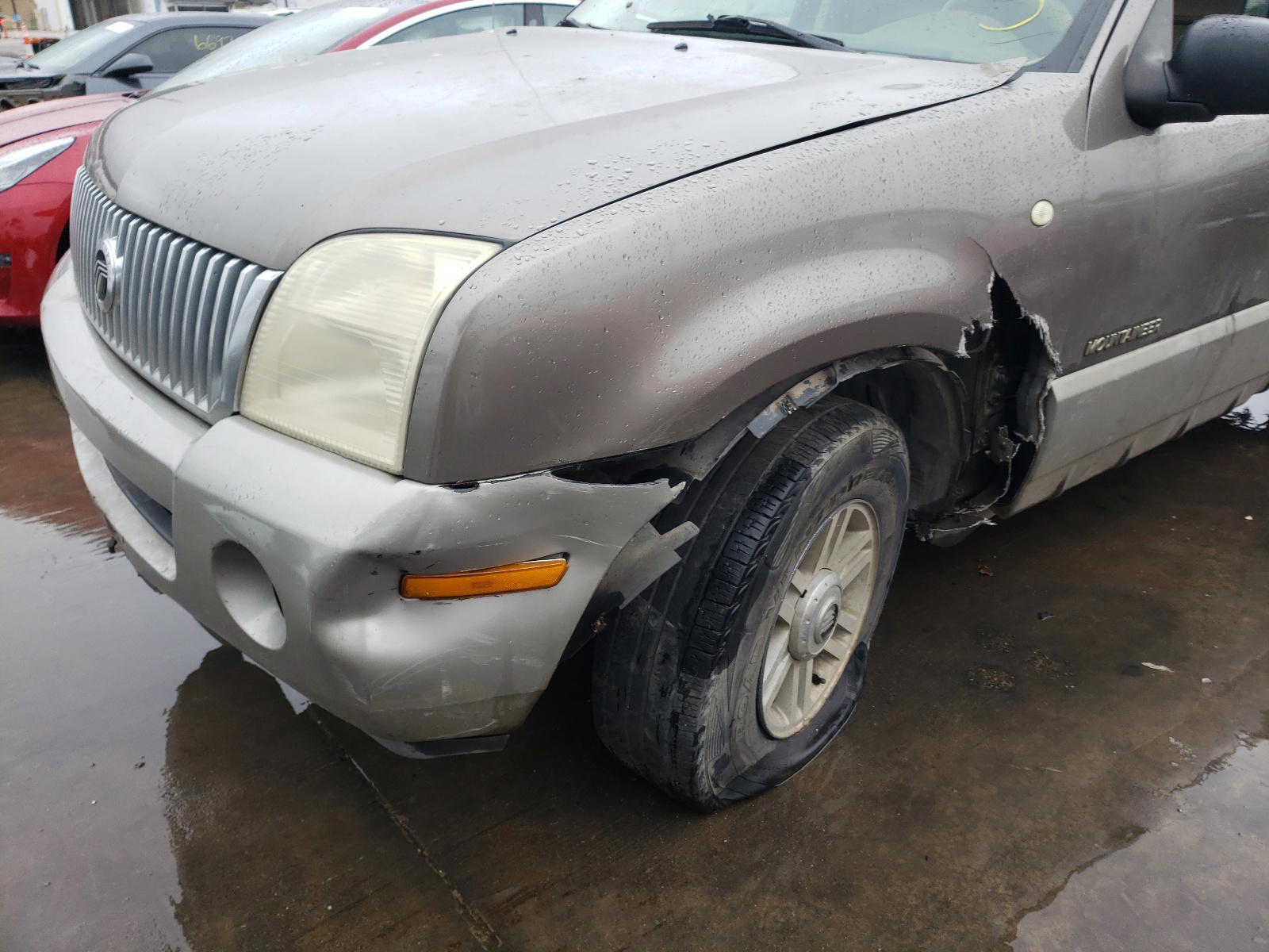 Photo 9 from auction – 2002 MERCURY MOUNTAINEE with VIN 4M2ZU66EX2ZJ15683
