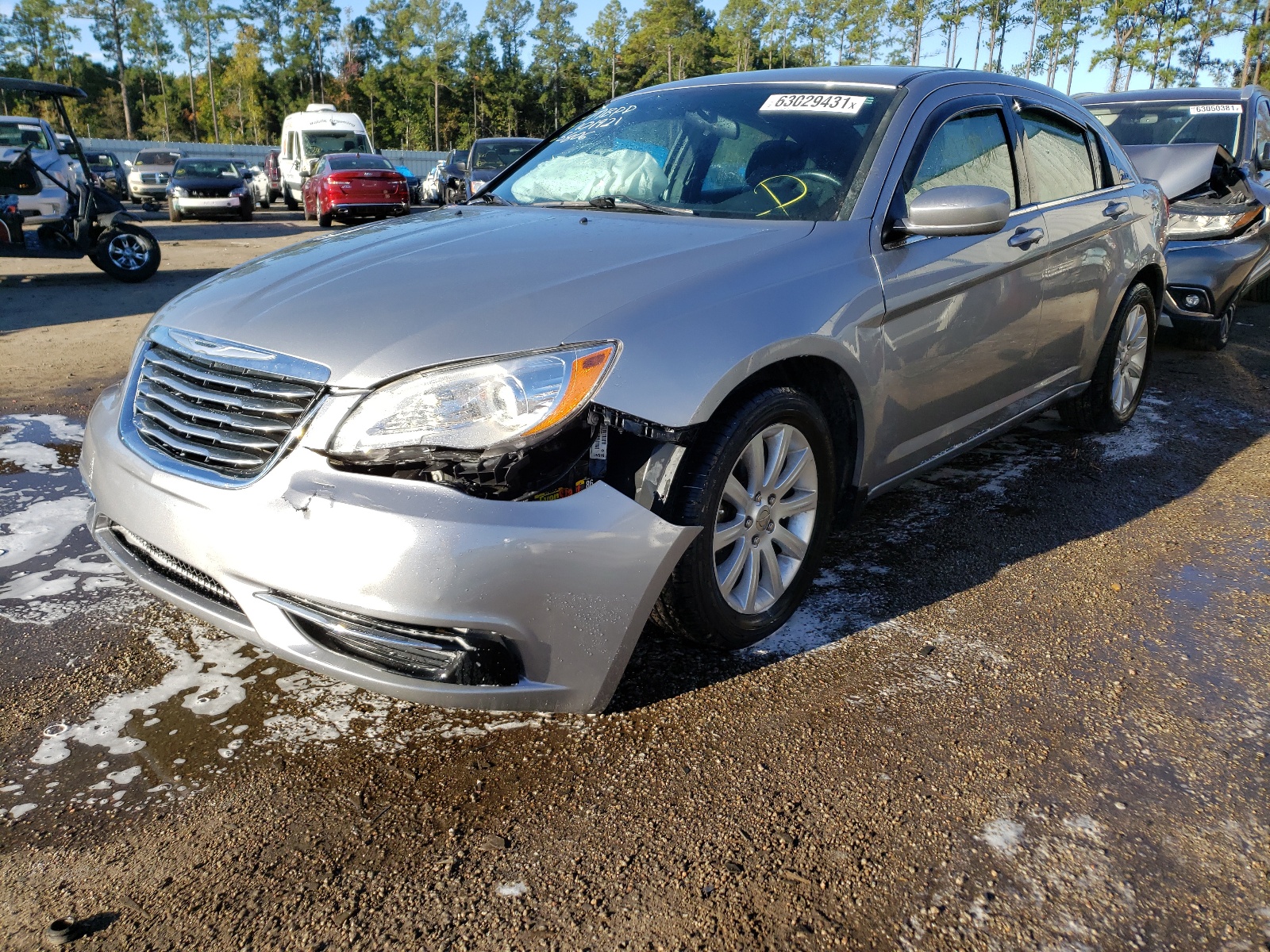 Photo 9 from auction – 2014 CHRYSLER 200 TOURIN with VIN 1C3CCBBG7EN105806