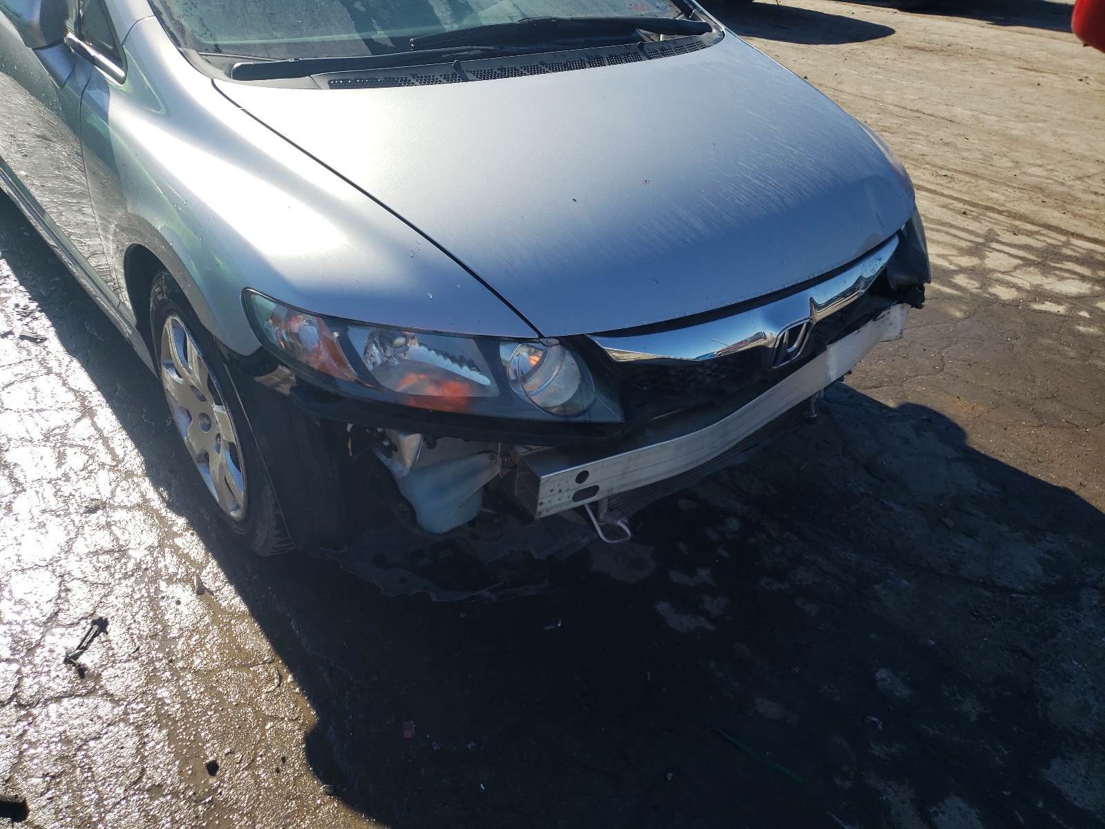 Photo 9 from auction – 2011 HONDA CIVIC LX with VIN 19XFA1F50BE044090