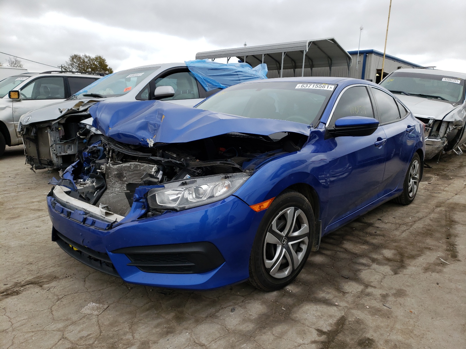 Photo 2 from auction – 2016 HONDA CIVIC LX with VIN 19XFC2F53GE014251