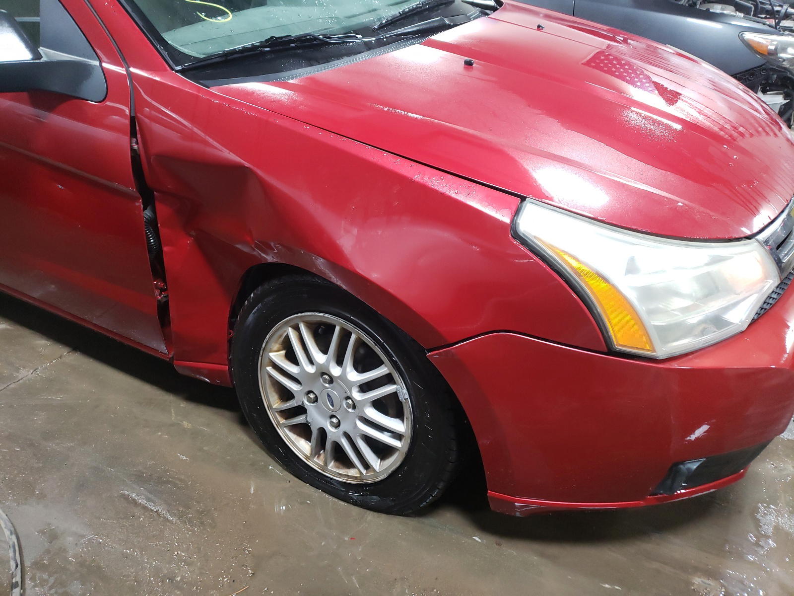 Photo 9 from auction – 2011 FORD FOCUS SE with VIN 1FAHP3FN8BW141553
