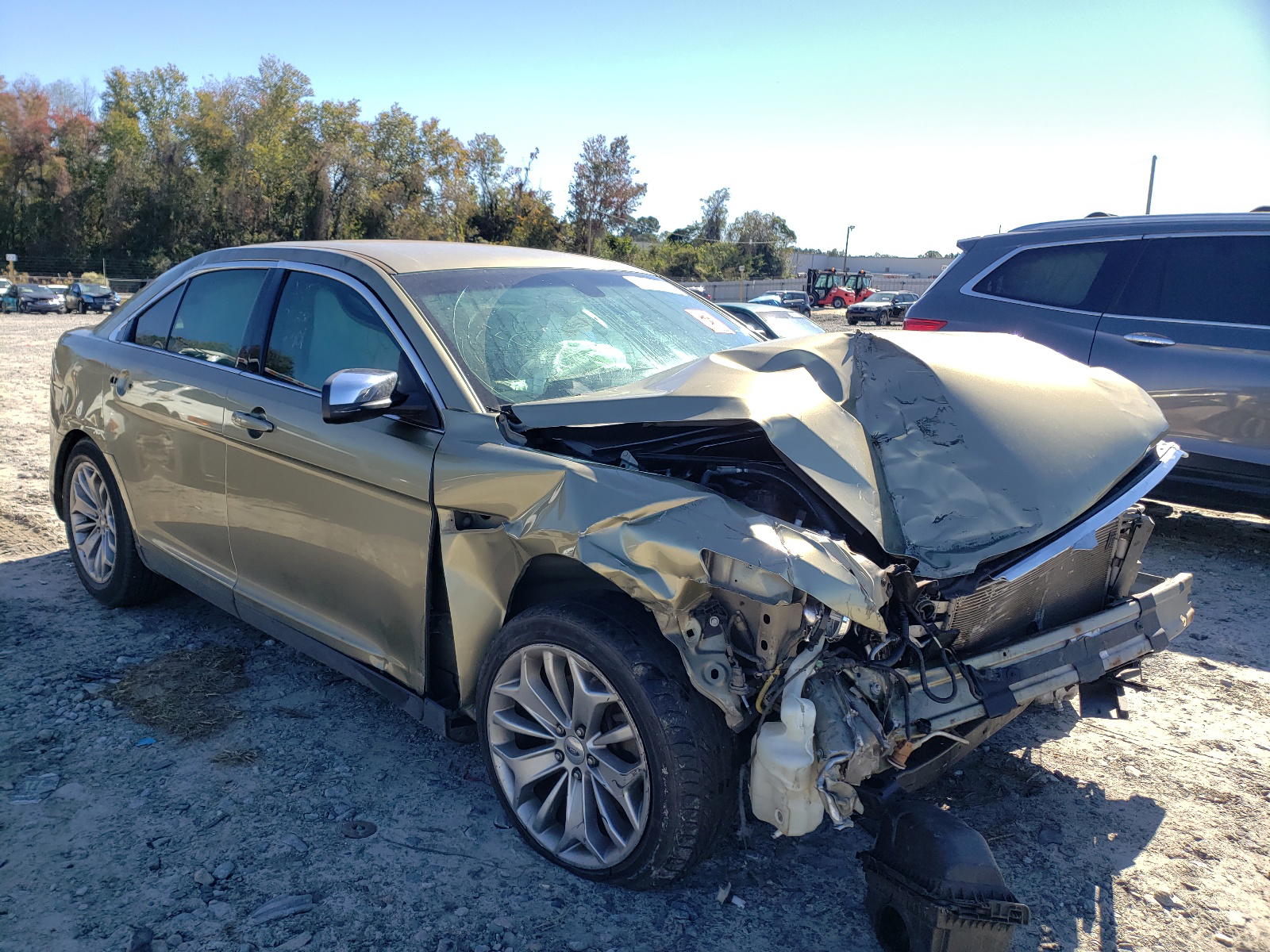 FORD TAURUS LIM 2013 with VIN 1FAHP2F8XDG226007 - Photo from auction