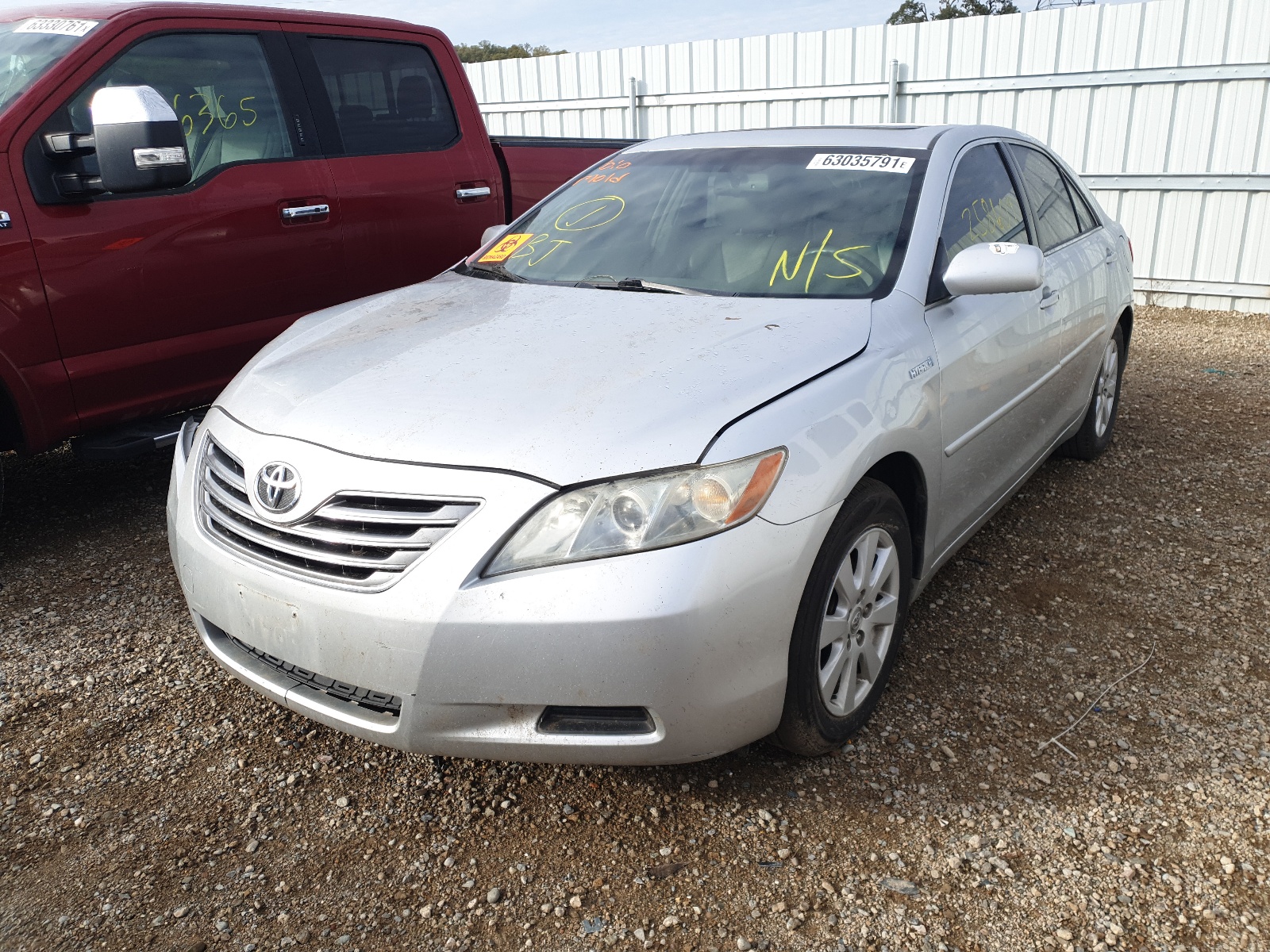Photo 2 from auction – 2007 TOYOTA CAMRY HYBR with VIN JTNBB46K973022618
