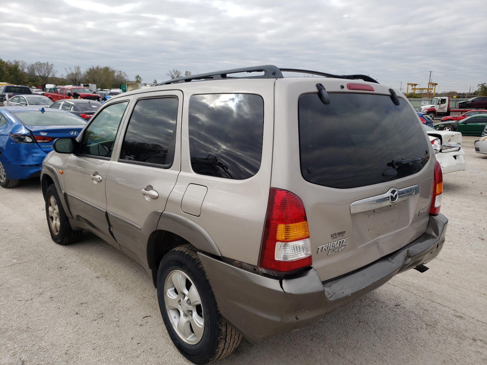 Photo 3 from auction – 2002 MAZDA TRIBUTE LX with VIN 4F2YU09132KM11628