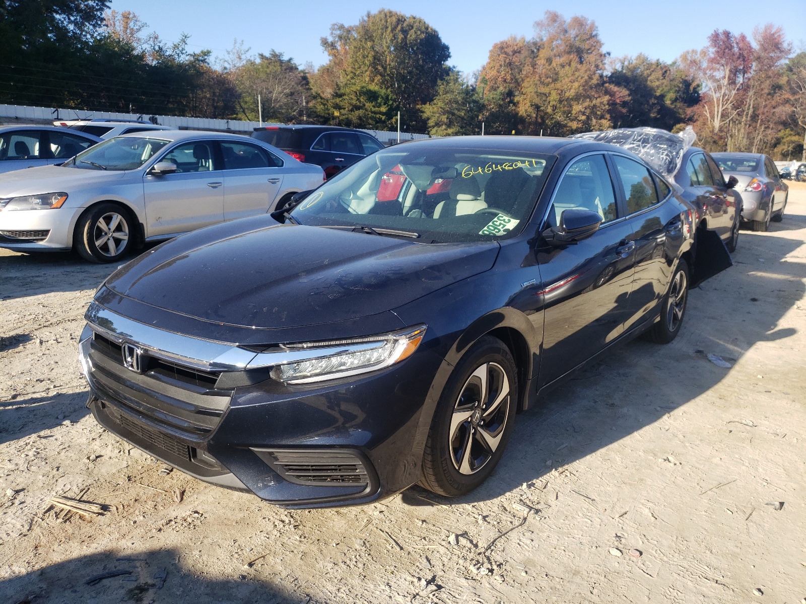 Photo 2 from auction – 2022 HONDA INSIGHT EX with VIN 19XZE4F55NE007916