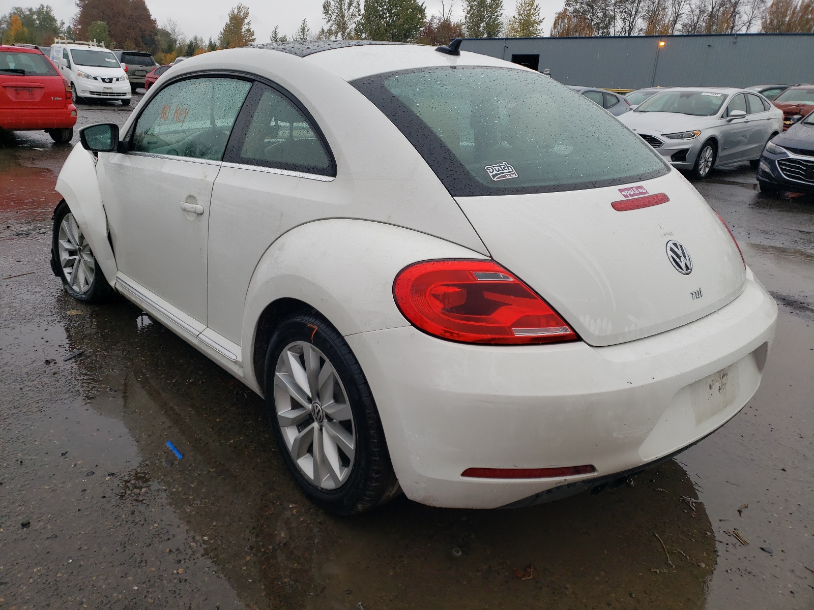 Photo 3 from auction – 2013 VOLKSWAGEN BEETLE with VIN 3VWJL7AT4DM632366