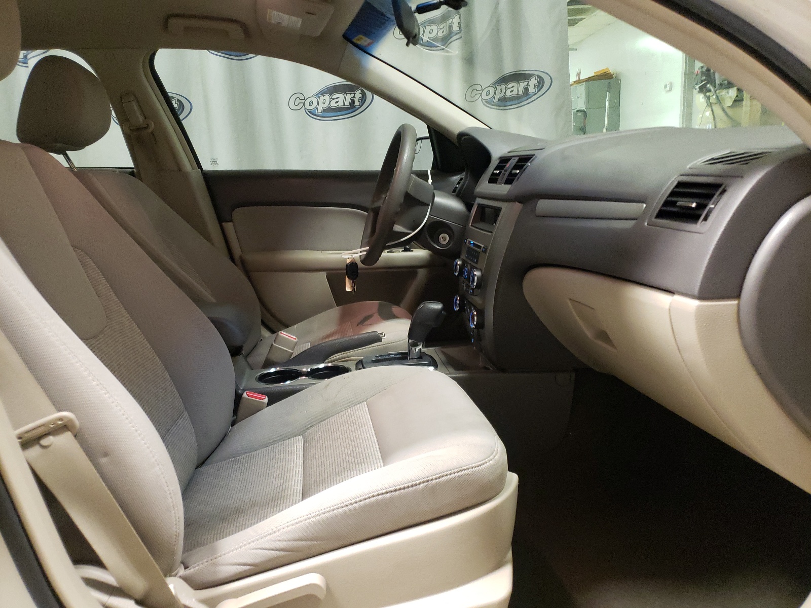 Photo 5 from auction – 2011 FORD FUSION S with VIN 3FAHP0GA9BR315790