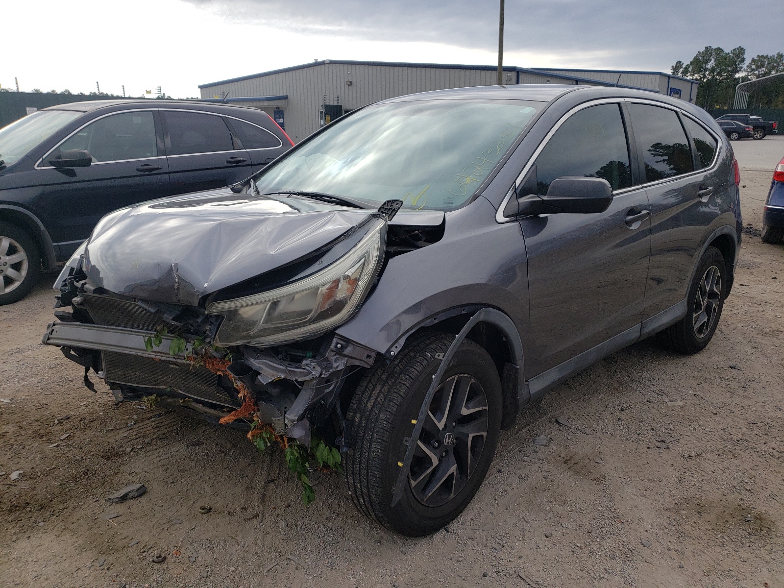 Photo 2 from auction – 2016 HONDA CR-V SE with VIN 2HKRM3H42GH542508