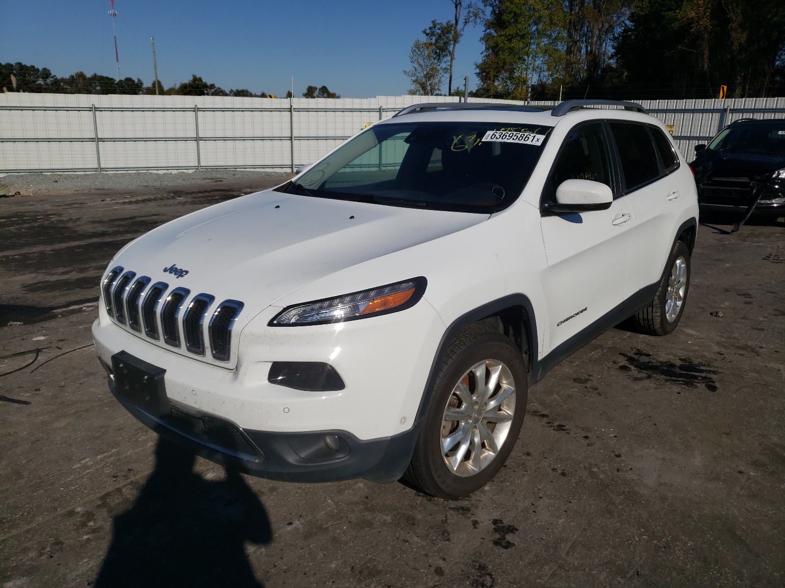 Photo 2 from auction – 2014 JEEP CHEROKEE L with VIN 1C4PJMDSXEW164052