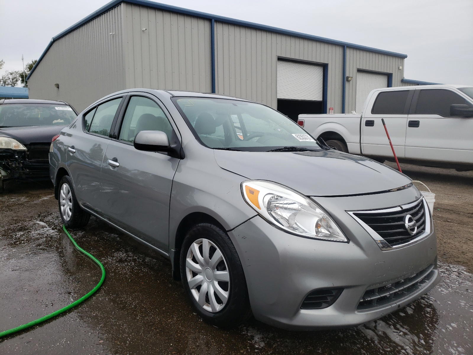 NISSAN VERSA S 2012 with VIN 3N1CN7AP4CL836374 - Photo from auction
