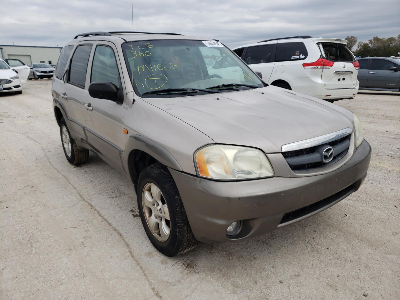 MAZDA TRIBUTE LX 2002 with VIN 4F2YU09132KM11628 - Photo from auction