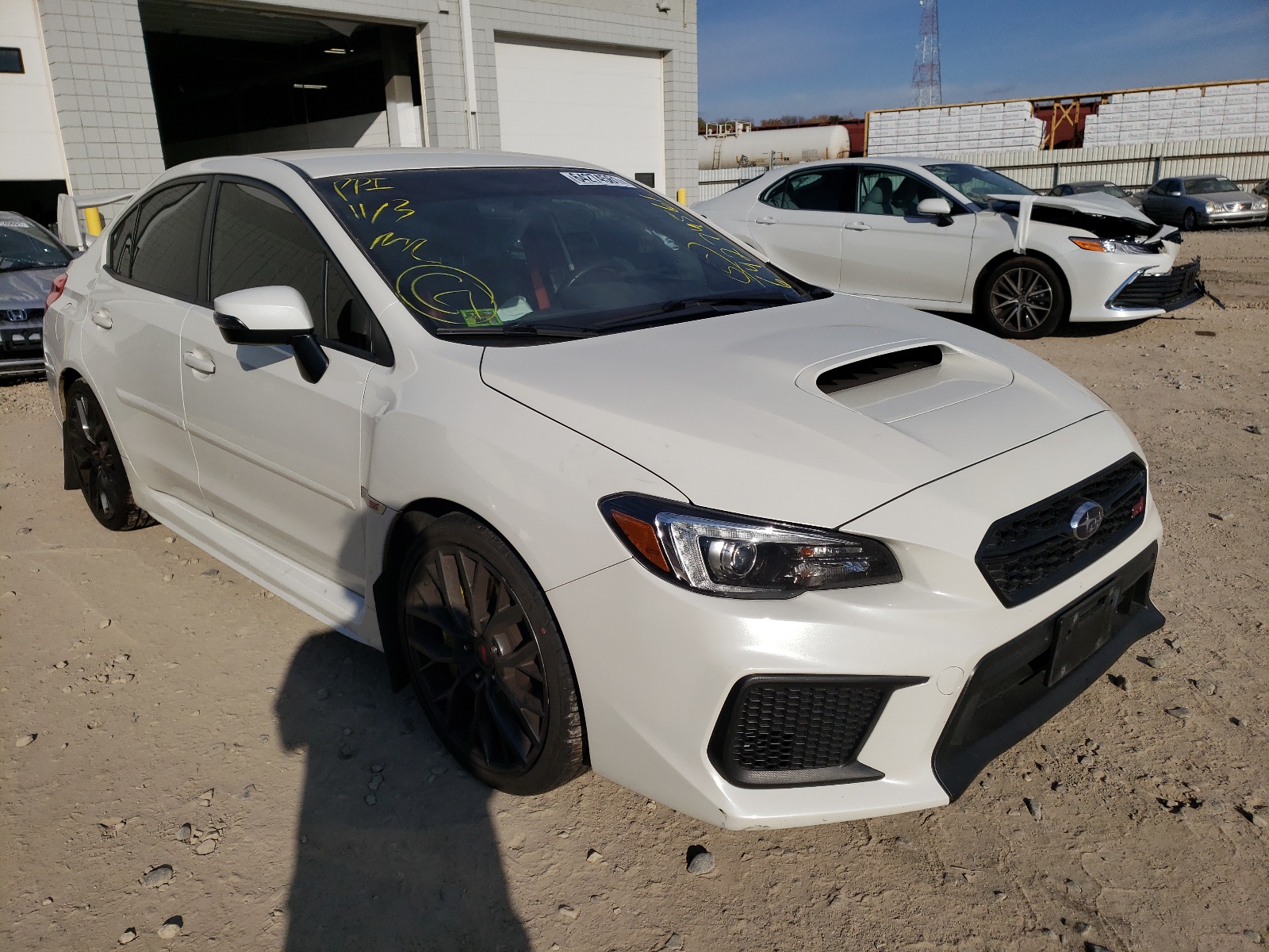 SUBARU WRX STI 2018 with VIN JF1VA2M65J9809865 - Photo from auction