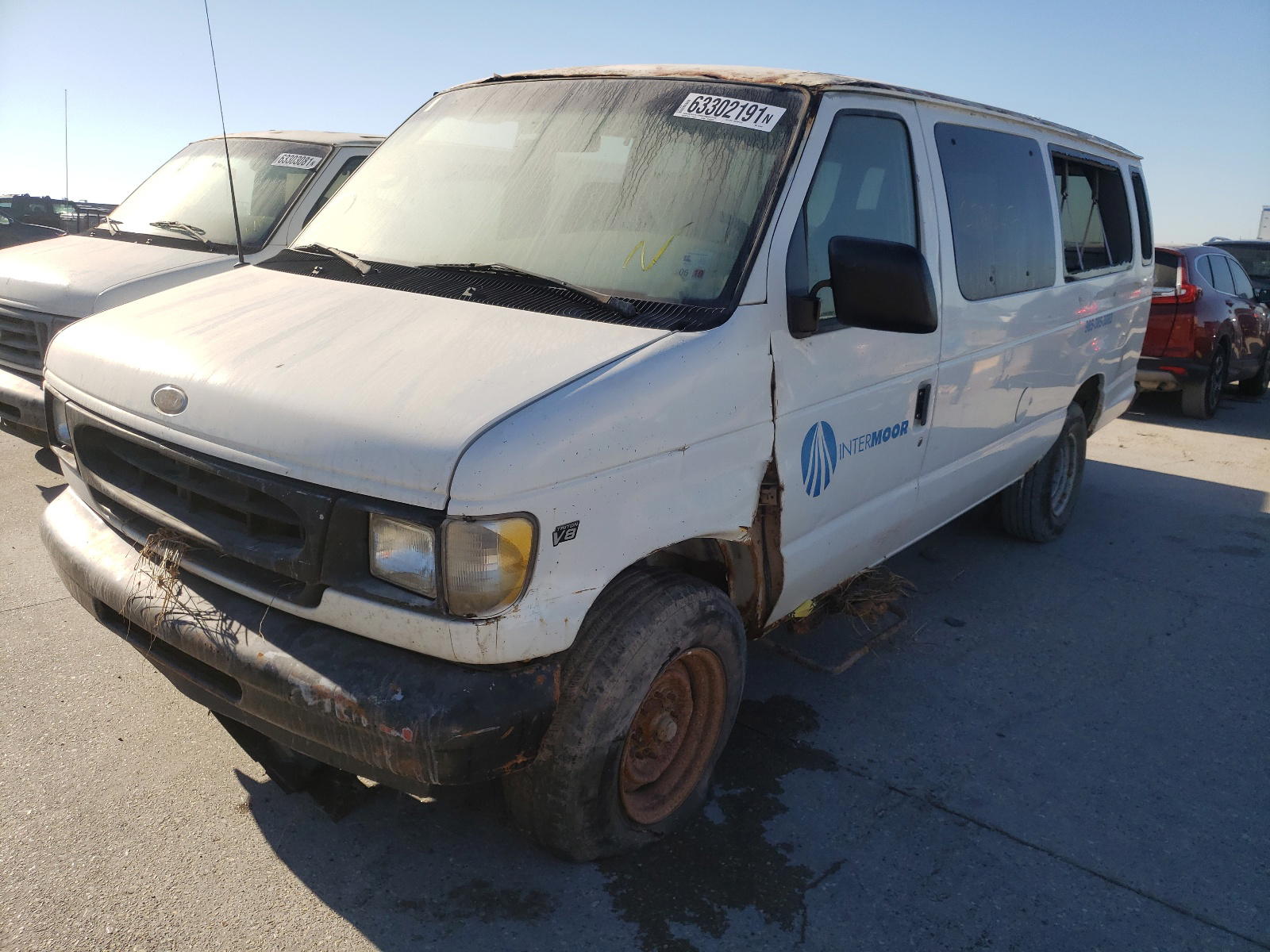 Photo 2 from auction – 2002 FORD E350 with VIN 1FBSS31L32HA74809