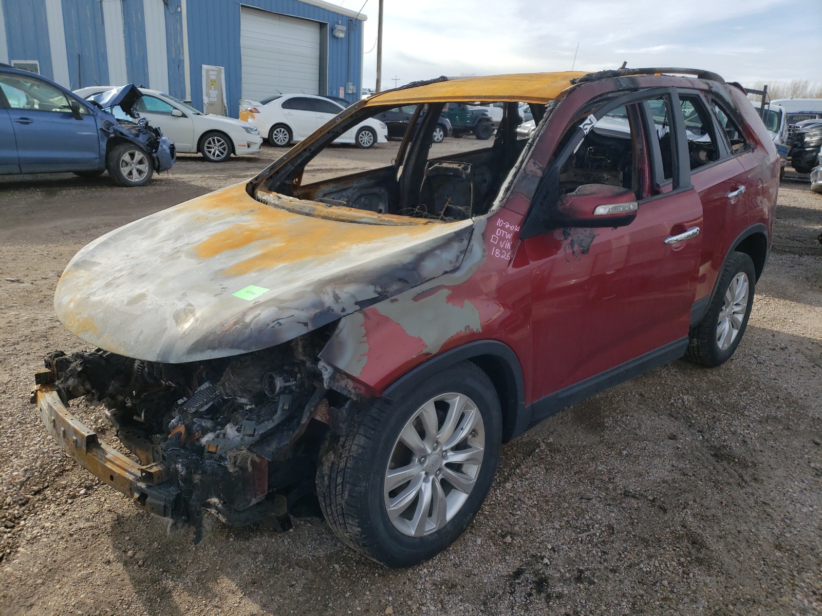 Photo 2 from auction – 2011 KIA SORENTO EX with VIN 5XYKU4A13BG011826