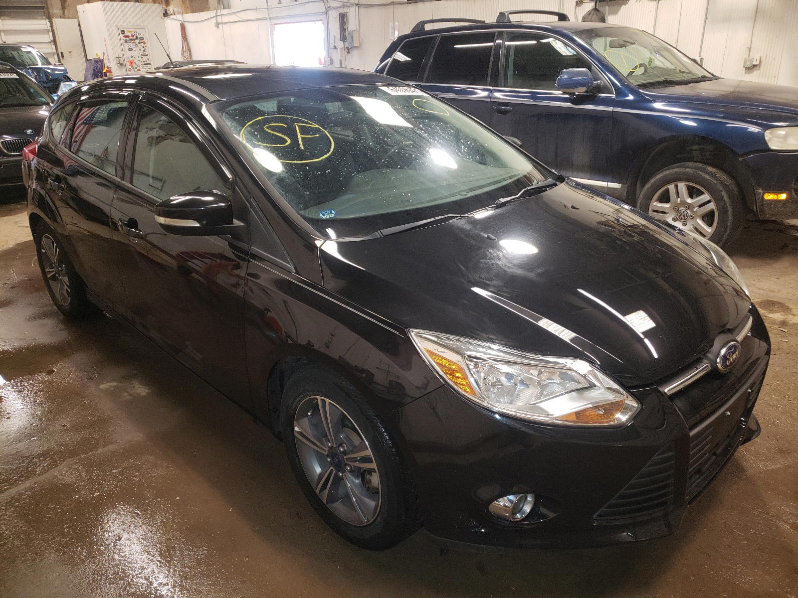 FORD FOCUS SE 2014 with VIN 1FADP3K20EL150201 - Photo from auction