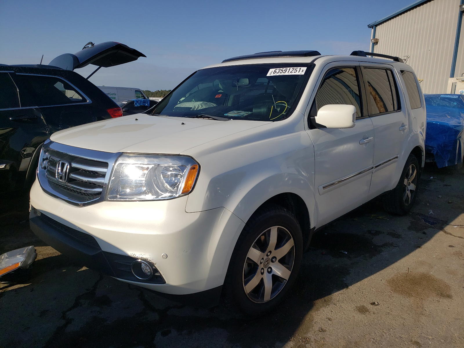 Photo 2 from auction – 2012 HONDA PILOT TOUR with VIN 5FNYF3H92CB042911