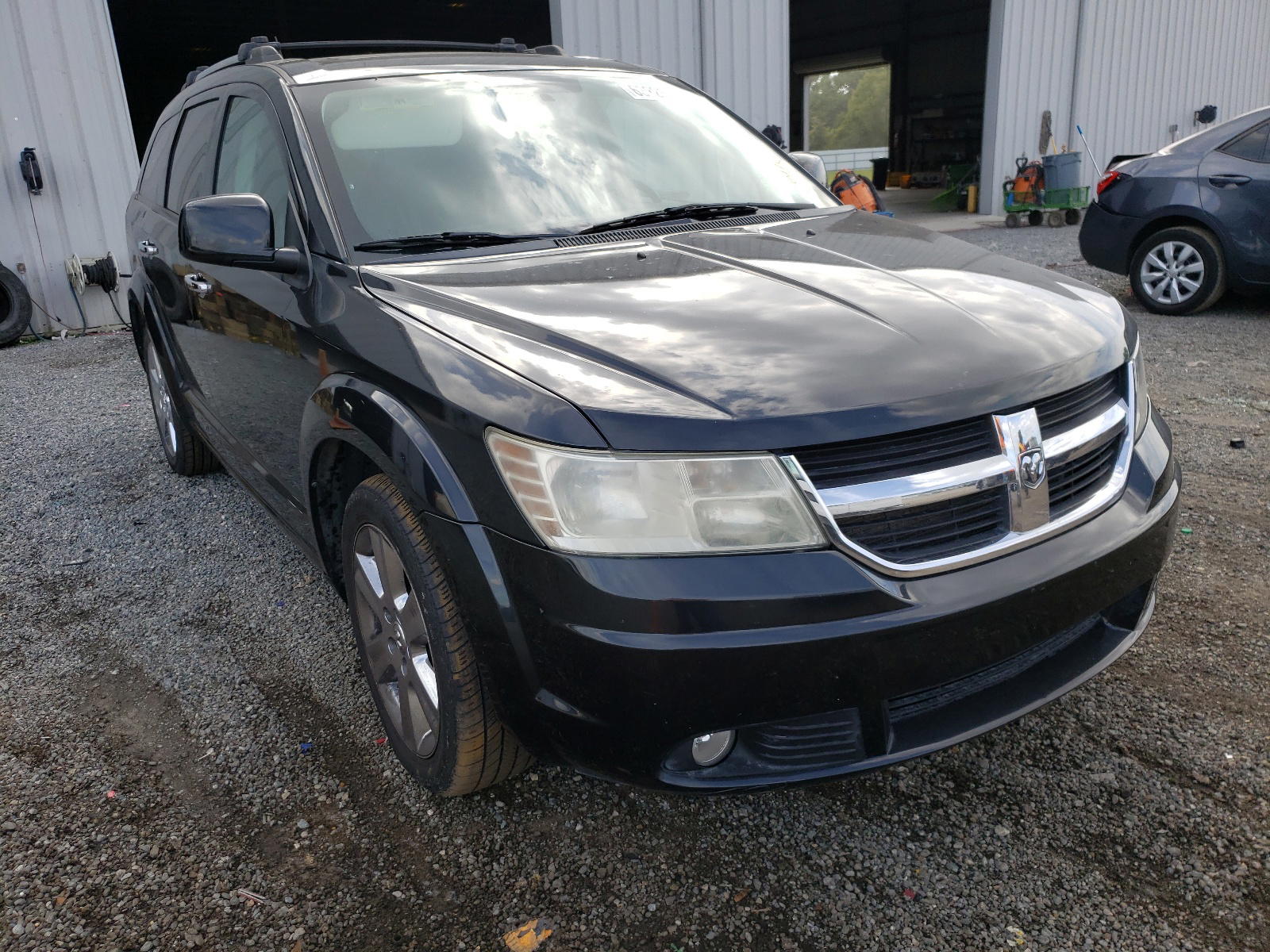 DODGE JOURNEY R/ 2010 with VIN 3D4PG9FV9AT232301 - Photo from auction