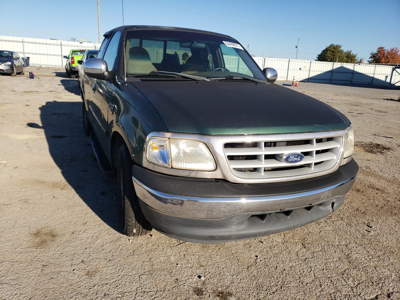 Photo 9 from auction – 1999 FORD F150 with VIN 1FTRX17W2XNA61835