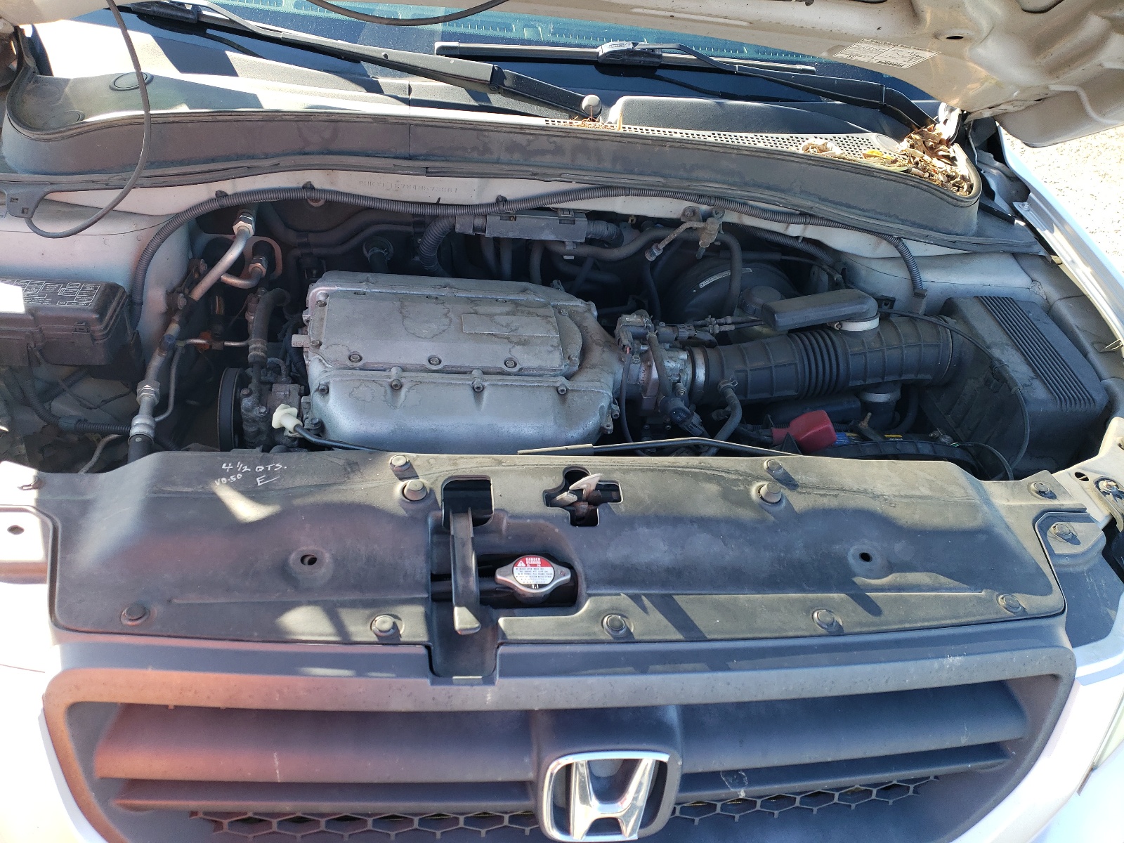 Photo 7 from auction – 2004 HONDA PILOT EXL with VIN 2HKYF18784H573861