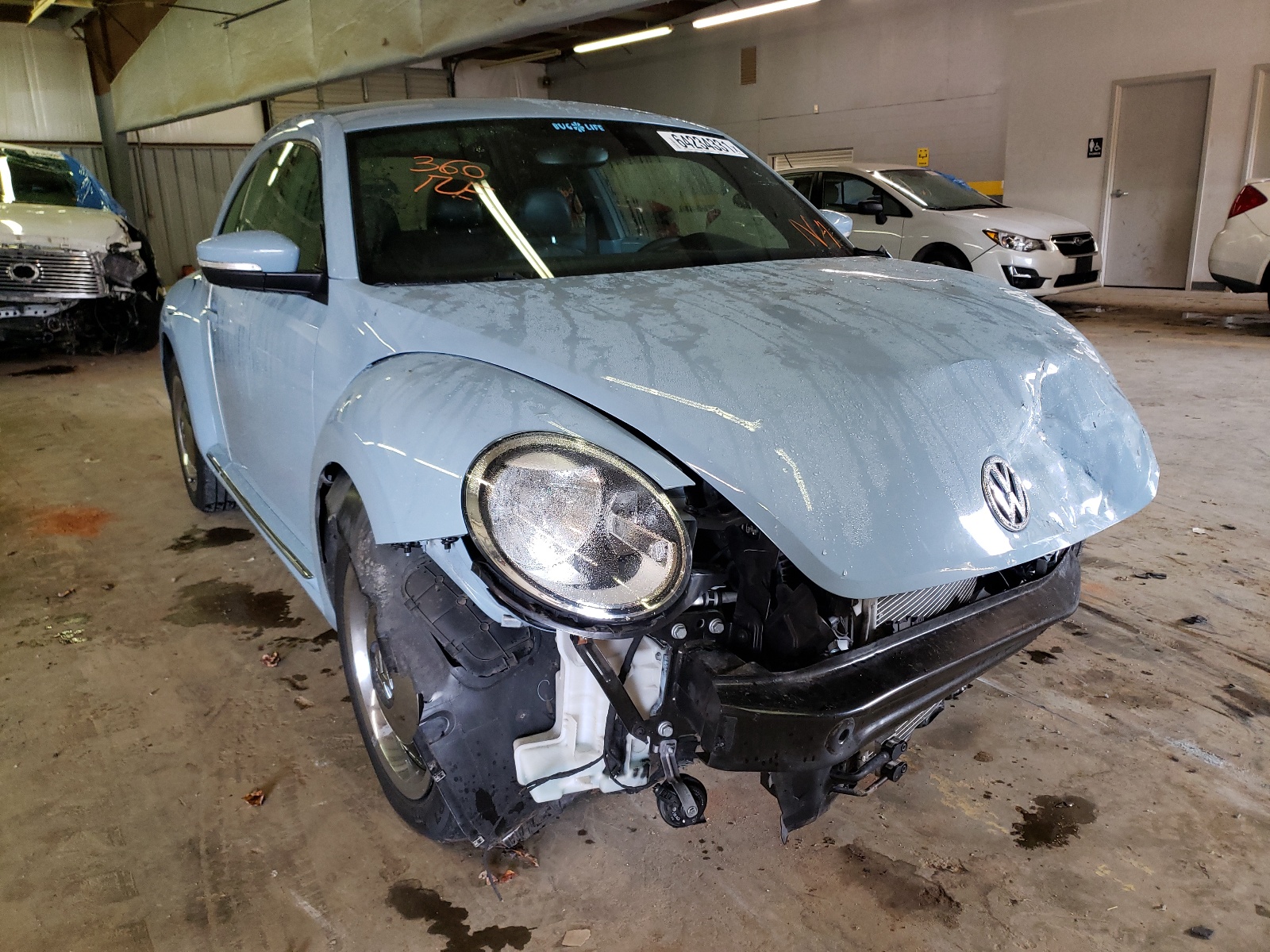 VOLKSWAGEN BEETLE 2013 with VIN 3VWJX7AT2DM619149 - Photo from auction