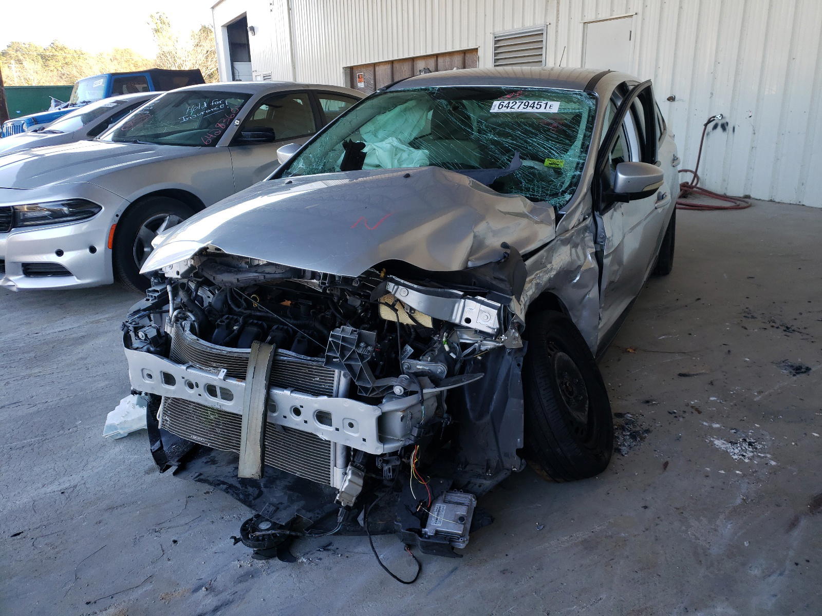 Photo 9 from auction – 2014 FORD FOCUS SE with VIN 1FADP3F27EL376519