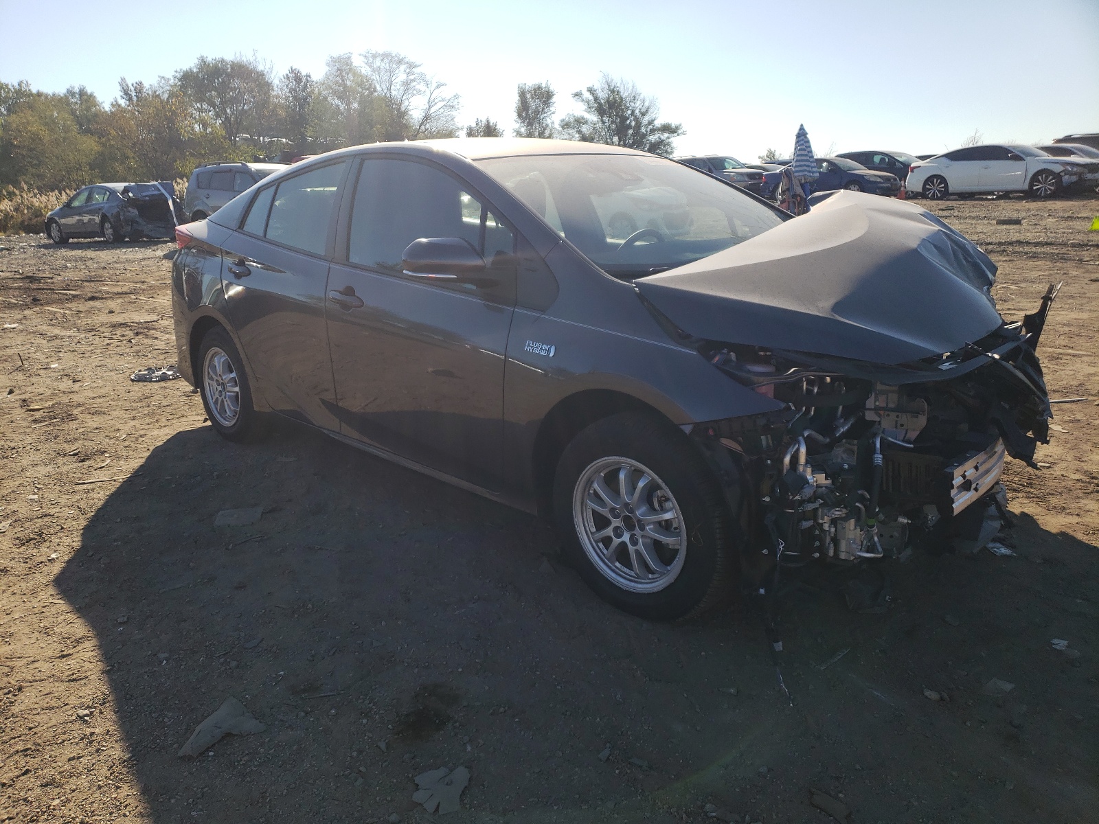 TOYOTA PRIUS PRIM 2021 with VIN JTDKAMFP2M3189658 - Photo from auction