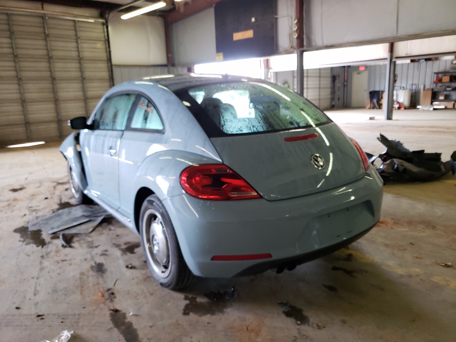 Photo 3 from auction – 2013 VOLKSWAGEN BEETLE with VIN 3VWJX7AT2DM619149