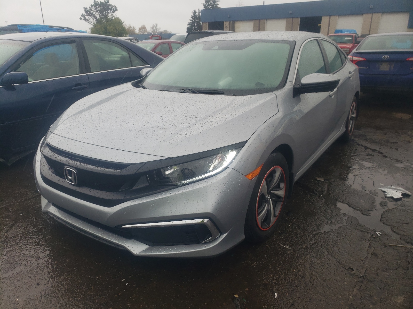 Photo 2 from auction – 2019 HONDA CIVIC LX with VIN 19XFC2F64KE049639