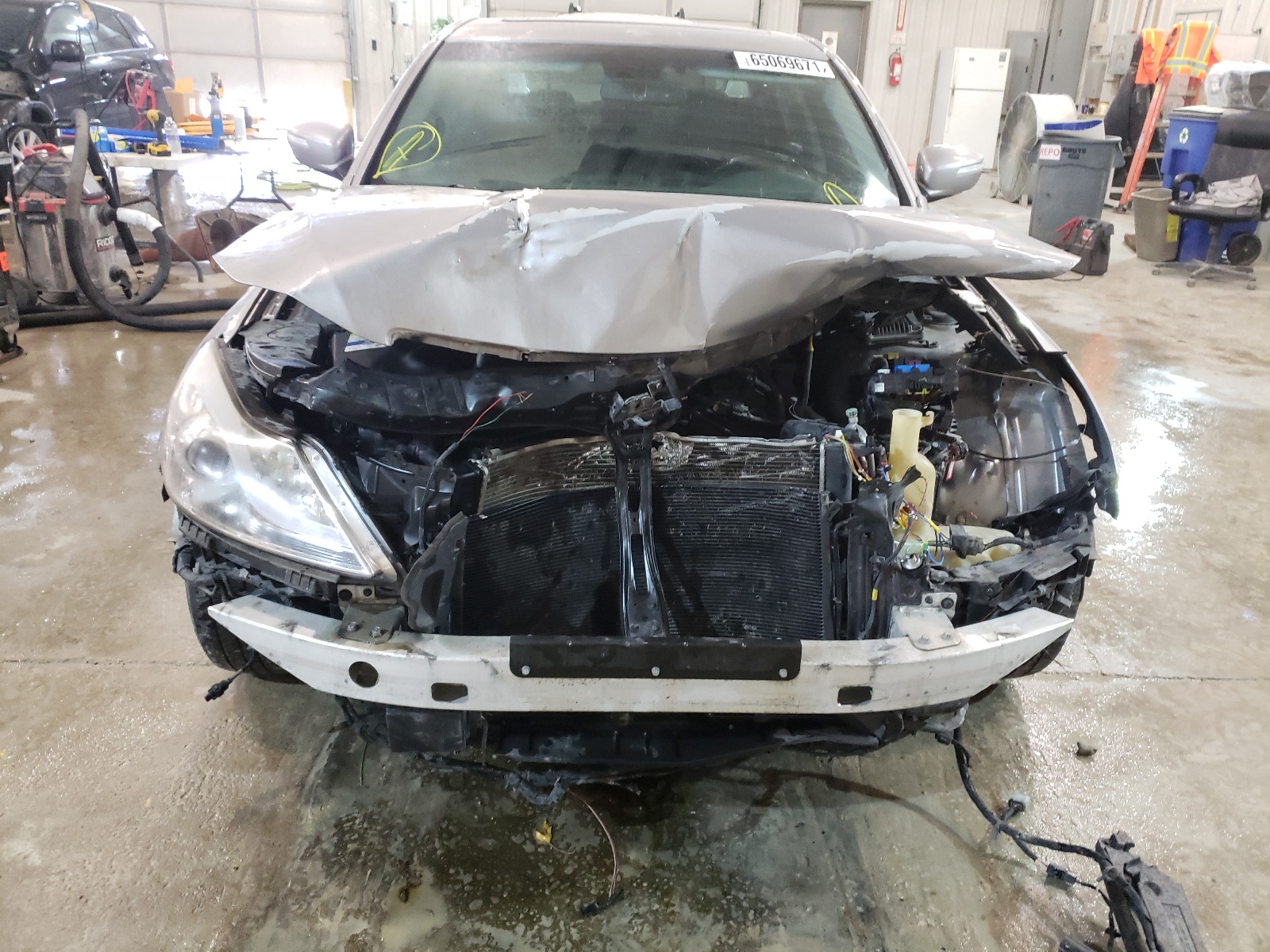 Photo 9 from auction – 2012 HYUNDAI GENESIS 3. with VIN KMHGC4DD8CU161151