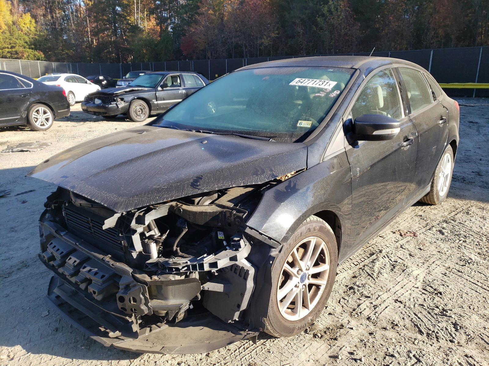 Photo 2 from auction – 2015 FORD FOCUS SE with VIN 1FADP3F22FL230174