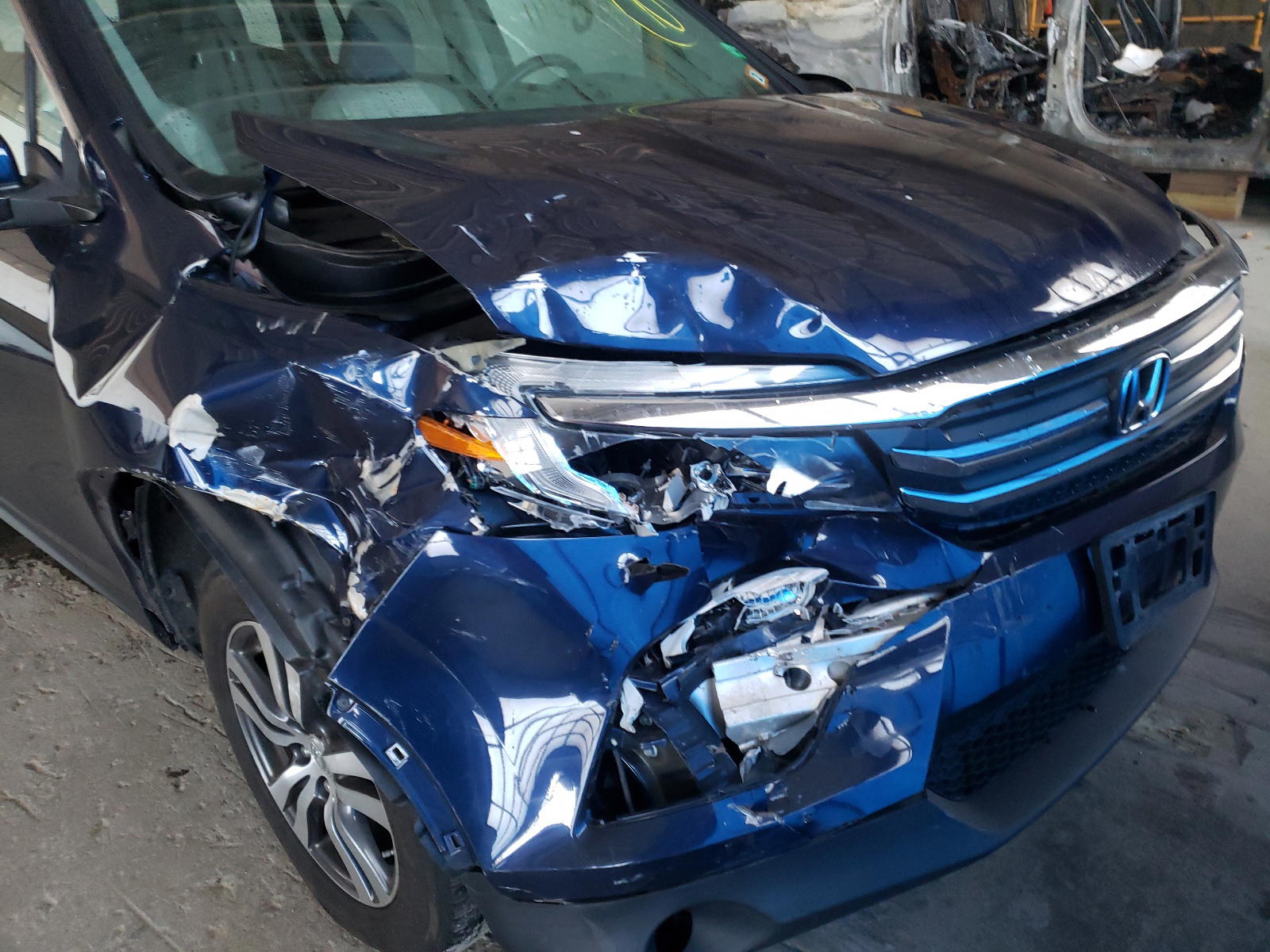 Photo 9 from auction – 2016 HONDA PILOT with VIN 5FNYF6H77GB102879