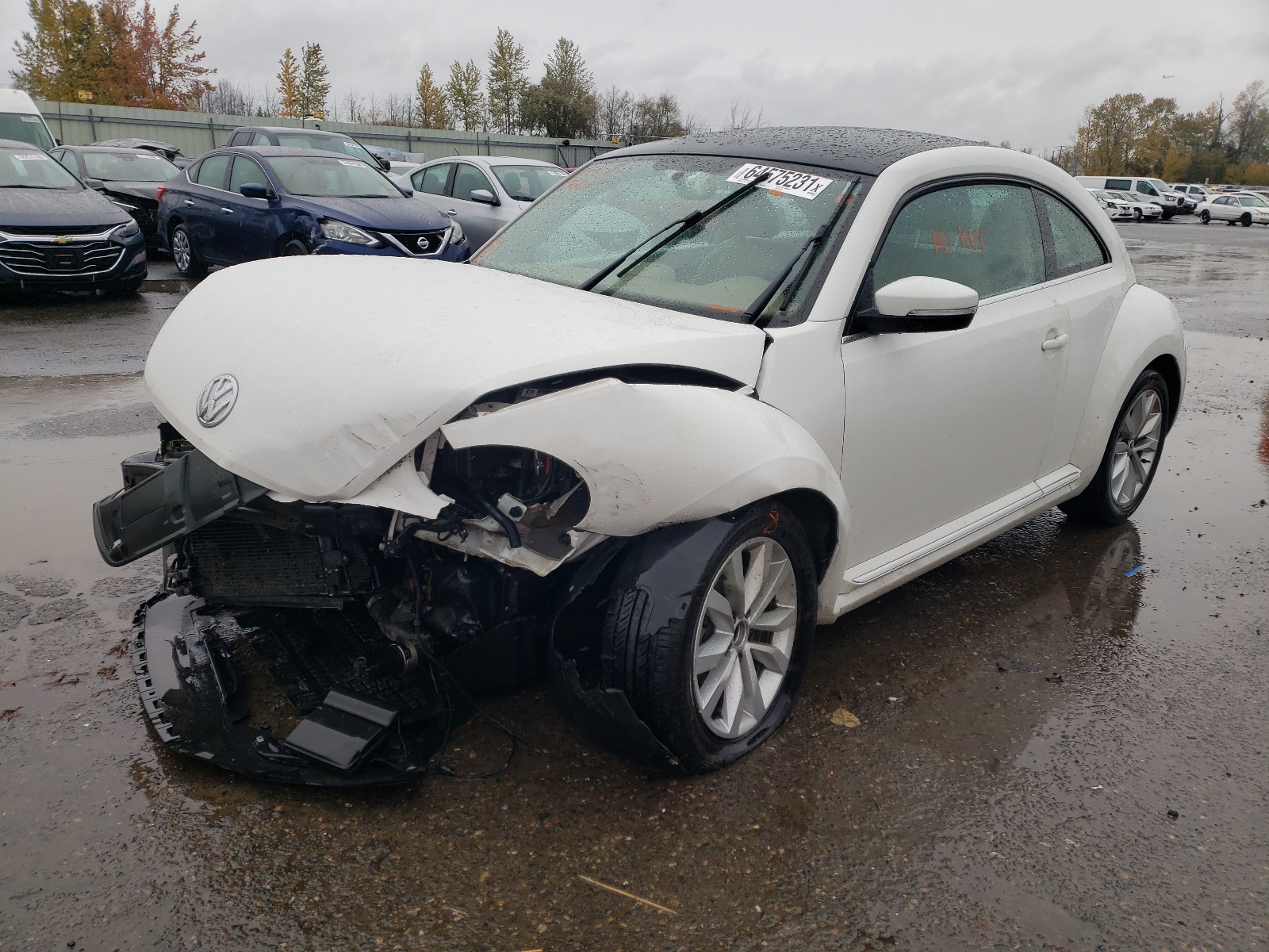 Photo 2 from auction – 2013 VOLKSWAGEN BEETLE with VIN 3VWJL7AT4DM632366