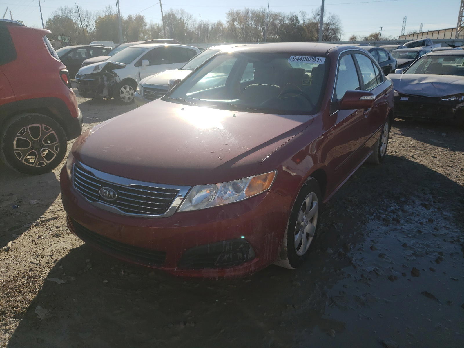 Photo 9 from auction – 2009 KIA OPTIMA LX with VIN KNAGE228295300246
