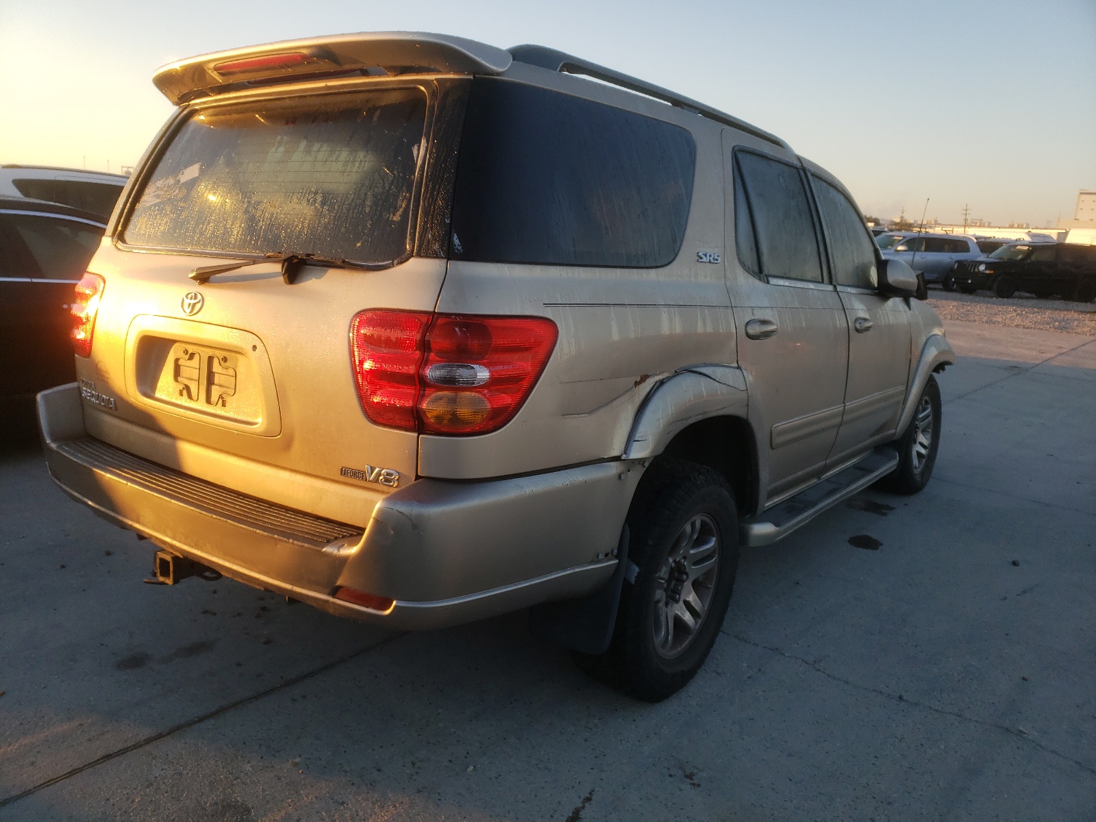 Photo 16 from auction – 2004 TOYOTA SEQUOIA SR with VIN 5TDZT34A74S228339