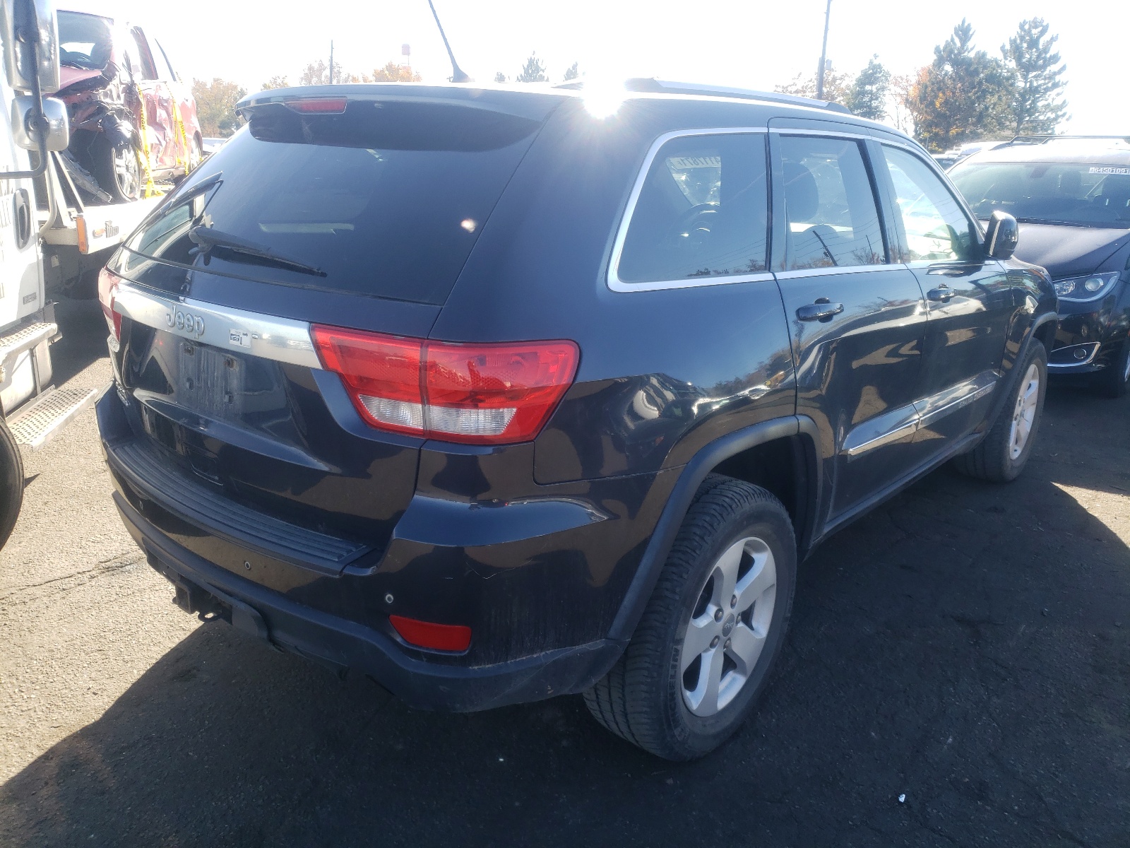 Photo 4 from auction – 2012 JEEP GRAND CHER with VIN 1C4RJFAG9CC255364