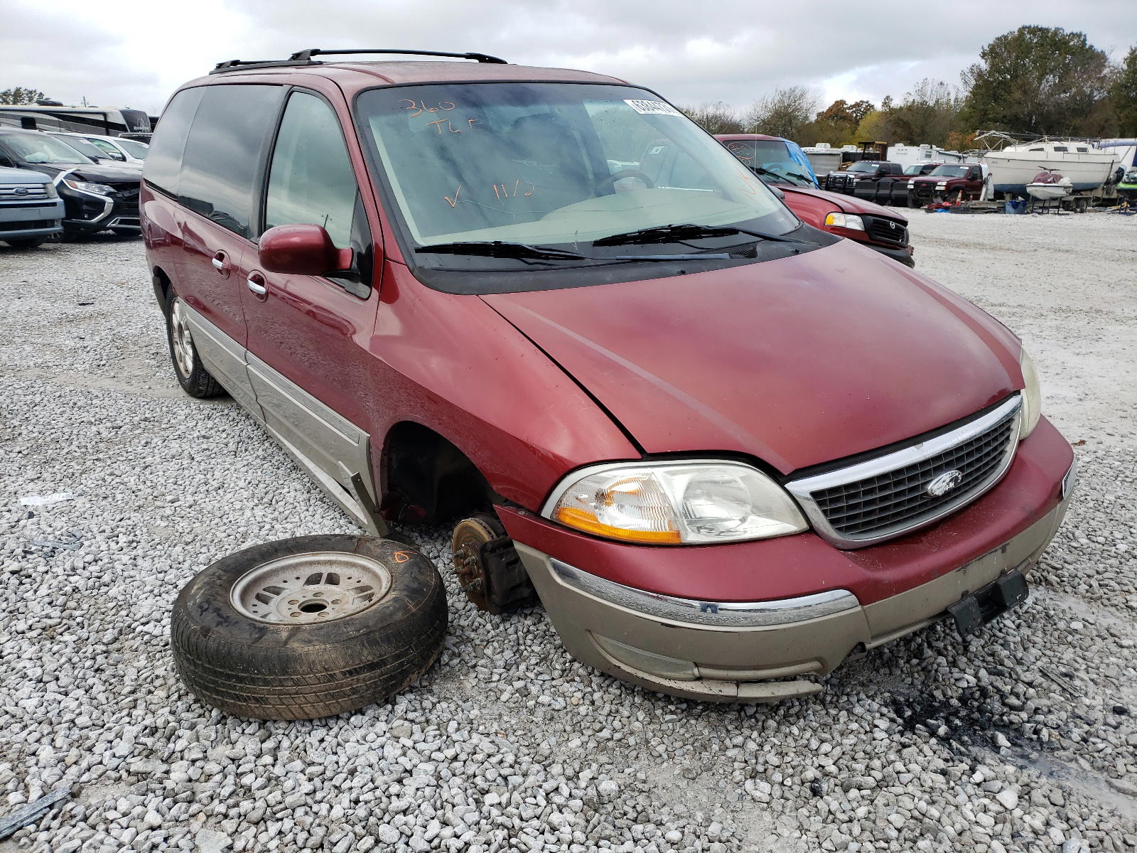 FORD WINDSTAR L 2003 with VIN 2FMDA584X3BA59932 - Photo from auction